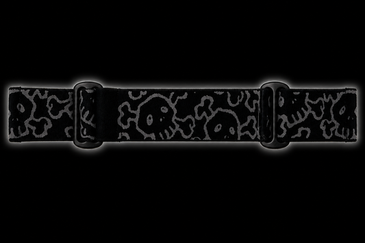 JT Flex paintball goggle strap featuring an all-over GREED skull pattern in grey on a black elastic strap with black adjustment hardware