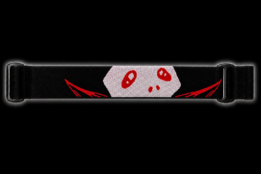 JT Flex paintball goggle strap featuring a white skull with red eyes on a black strap with red Bowie knife blade accents and black adjustment hardware.